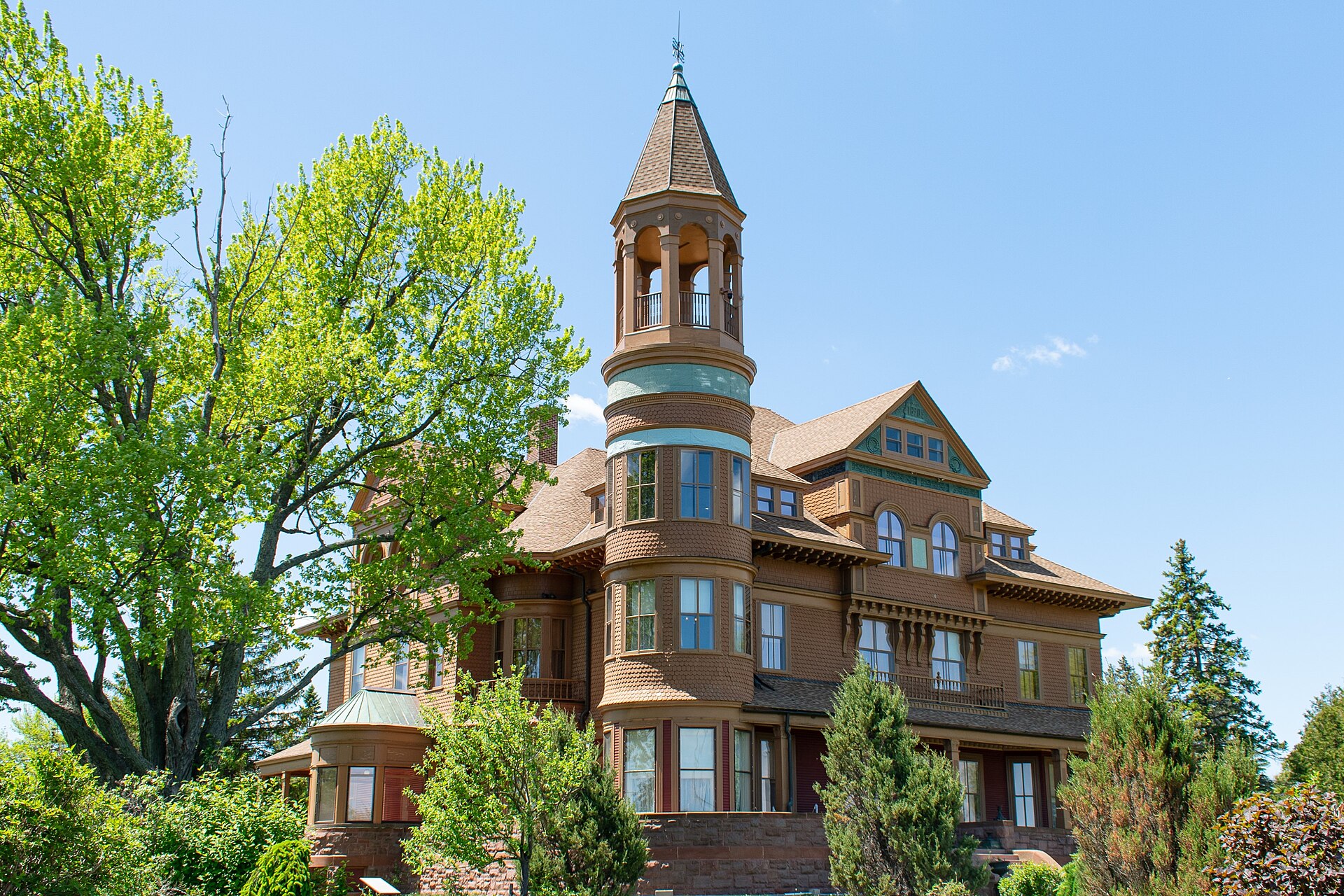 The turreted brownstone and shingle facade of Fairlawn Mansion on East Second Street in Superior, Wisconsin