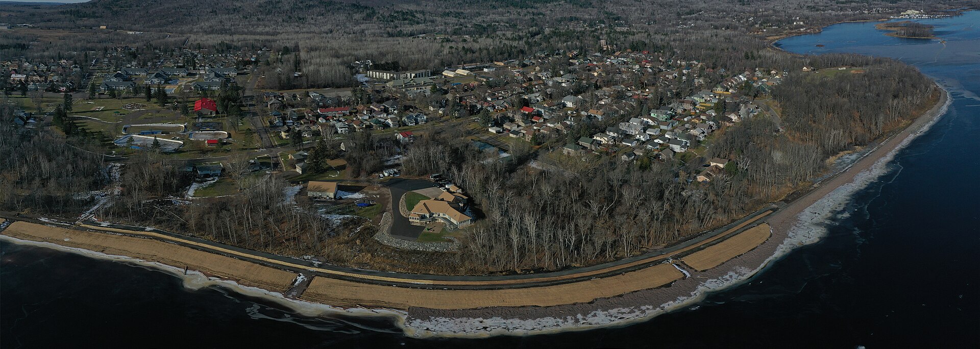 Aerial view of the Morgan Park neighborhood of Duluth on the bank of the St. Louis River in late autumn